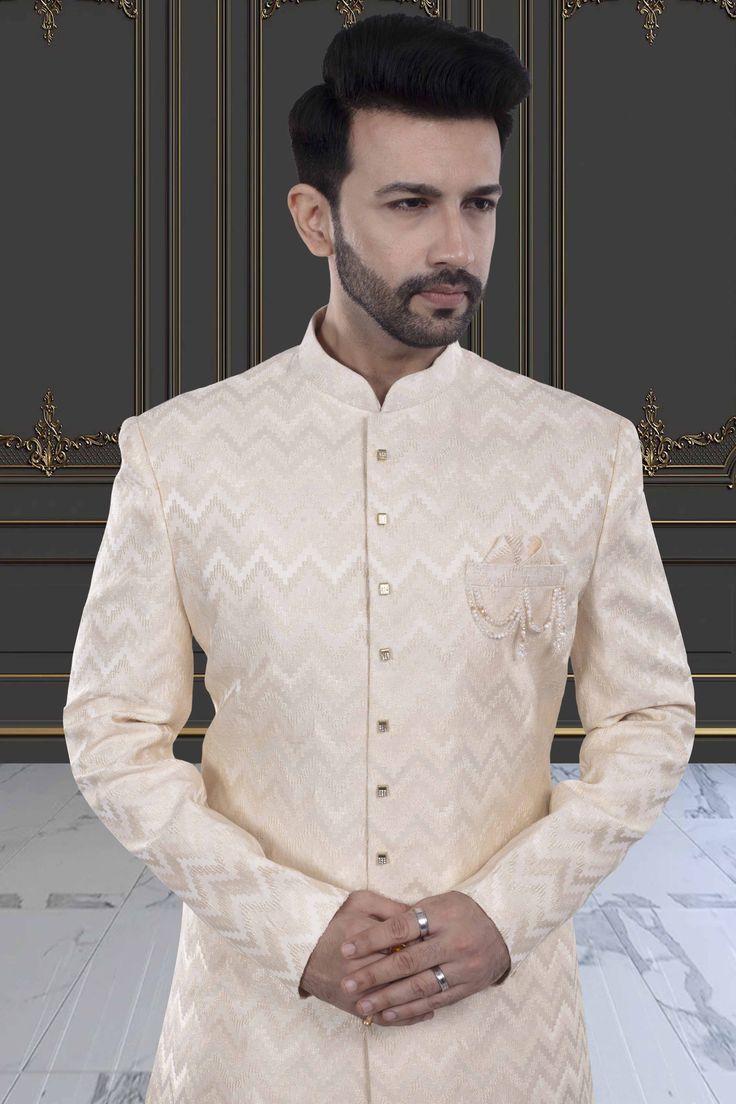 Embrace effortless elegance with our Mens Sherwani- V20-S46. Featuring a sleek design and a budget-friendly price, this sherwani effortlessly elevates your festive look. Experience the luxury of simplicity with our exquisite sherwani. Elegant Long Sleeve Sherwani For Diwali, Elegant Nehru Jacket For Groom At Diwali, Cream Fitted Sherwani For Semi-formal Occasions, Semi-formal Fitted Cream Sherwani, Festive Semi-formal Long Sleeve Sherwani, White Kurta For Semi-formal Festive Occasions, White Semi-formal Kurta For Festive Occasions, Elegant Cream Sherwani For Semi-formal Occasions, White Semi-formal Festive Kurta