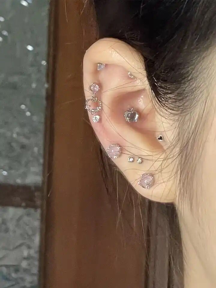 a woman with ear piercings on her ears