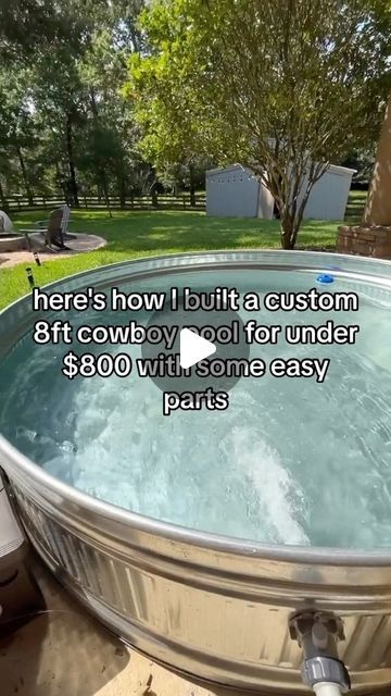 there is a large metal tub in the yard with water running through it and an advertisement about how i built a custom 8ft cowboy pool for under $ 80