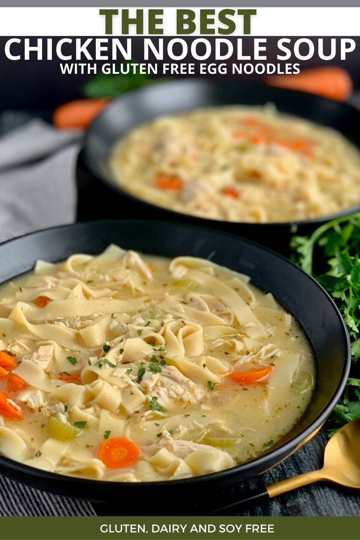 two black bowls filled with chicken noodle soup