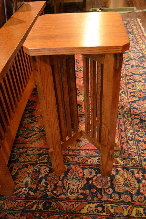 a wooden table sitting on top of a rug