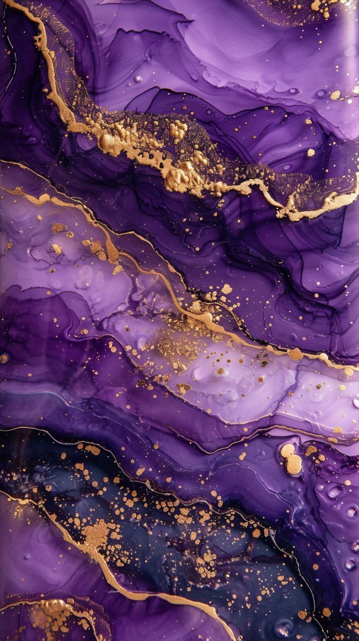 an iphone case with purple and gold paint