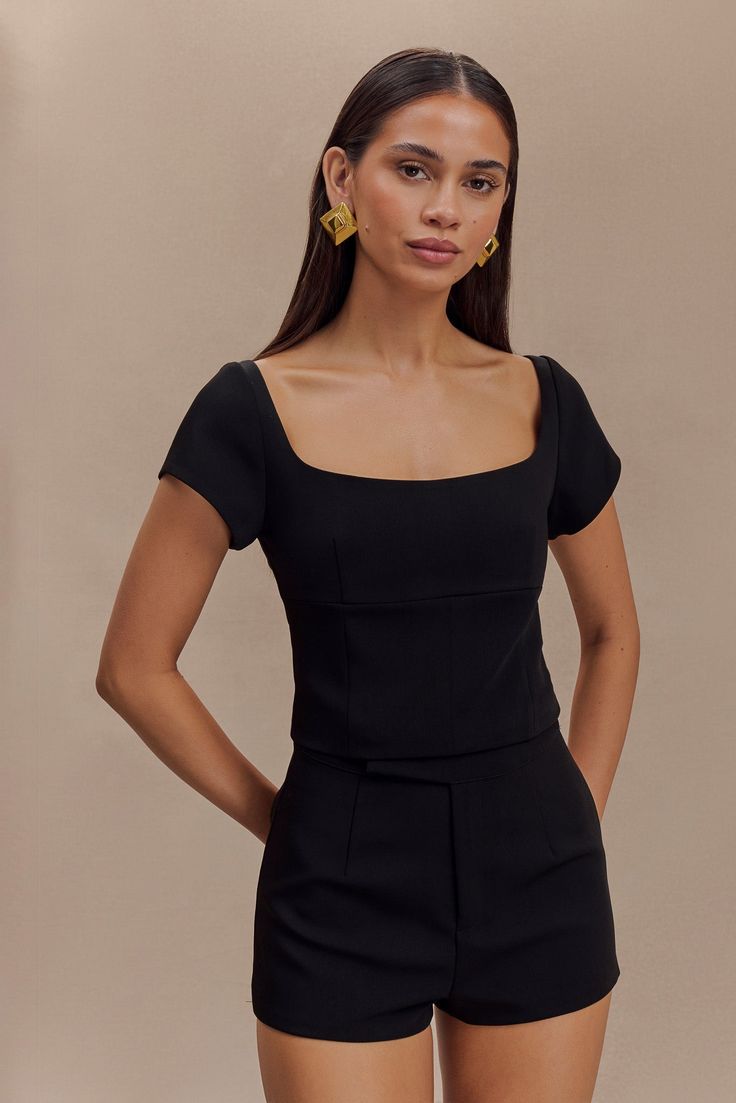 Modern tailoring, redefined. The ELLIS Cap Sleeve Longline Suiting Top offers a sophisticated take on contemporary suiting. With a wide neckline and cap sleeves, this top is designed to enhance your silhouette. The structured bodice, featuring underbust and waist panelling, creates a polished, flattering fit. Finished with a discreet side zip for a seamless look, the Ellis is a versatile addition to your wardrobe, perfect for elevating your tailored ensembles. Capsule Wardrobe Accessories, Workwear Capsule Wardrobe, Modern Tailoring, Workwear Capsule, Capsule Wardrobe Basics, European Summer Outfits, Maxi Dress Sale, Capsule Outfits, Wardrobe Accessories