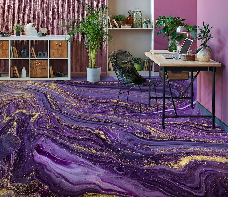 a room with purple and gold paint on the floor