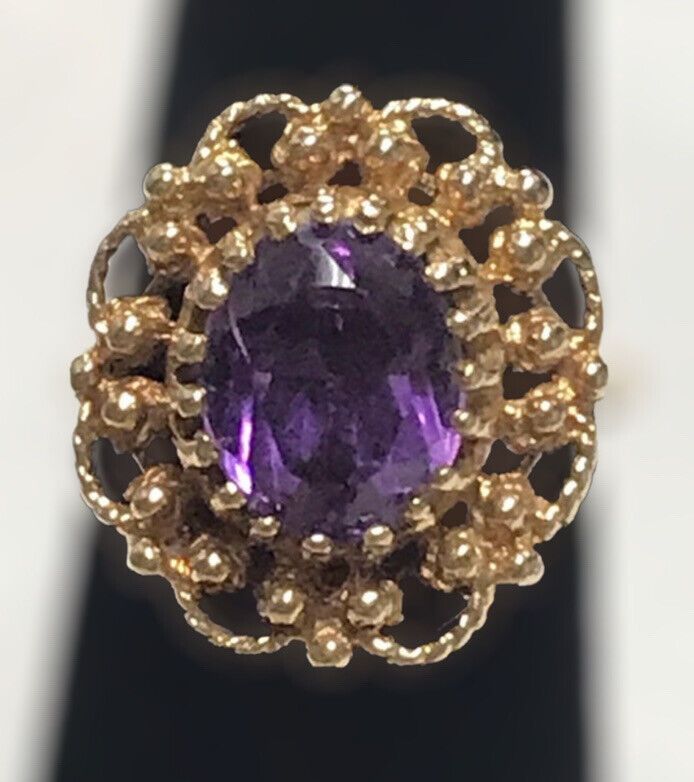 VINTAGE AMETHYST 14K YELLOW GOLD FILIGREE RING Beautifully crafted in 14k yellow gold, this 3CT Oval cut Amethyst Solitaire Ring is sure to please! This item is vintage and in excellent condition. It is sure to be one of your favorite pieces! Purple Vivid Hue 4.7 Grams Shipped insured/delivery confirmation I guarantee item to be exactly as described and pictured. Gold Oval Gemstone Filigree Ring, Antique 14k Gold Amethyst Ring, Purple Oval Filigree Rings, Oval Yellow Gold Rings, Estate Style 14k Gold Rings, Oval Yellow Gold Filigree Ring With Gemstone, Yellow Gold Amethyst Oval Ring, Oval Amethyst Rings In Yellow Gold, Estate 14k Yellow Gold Rings