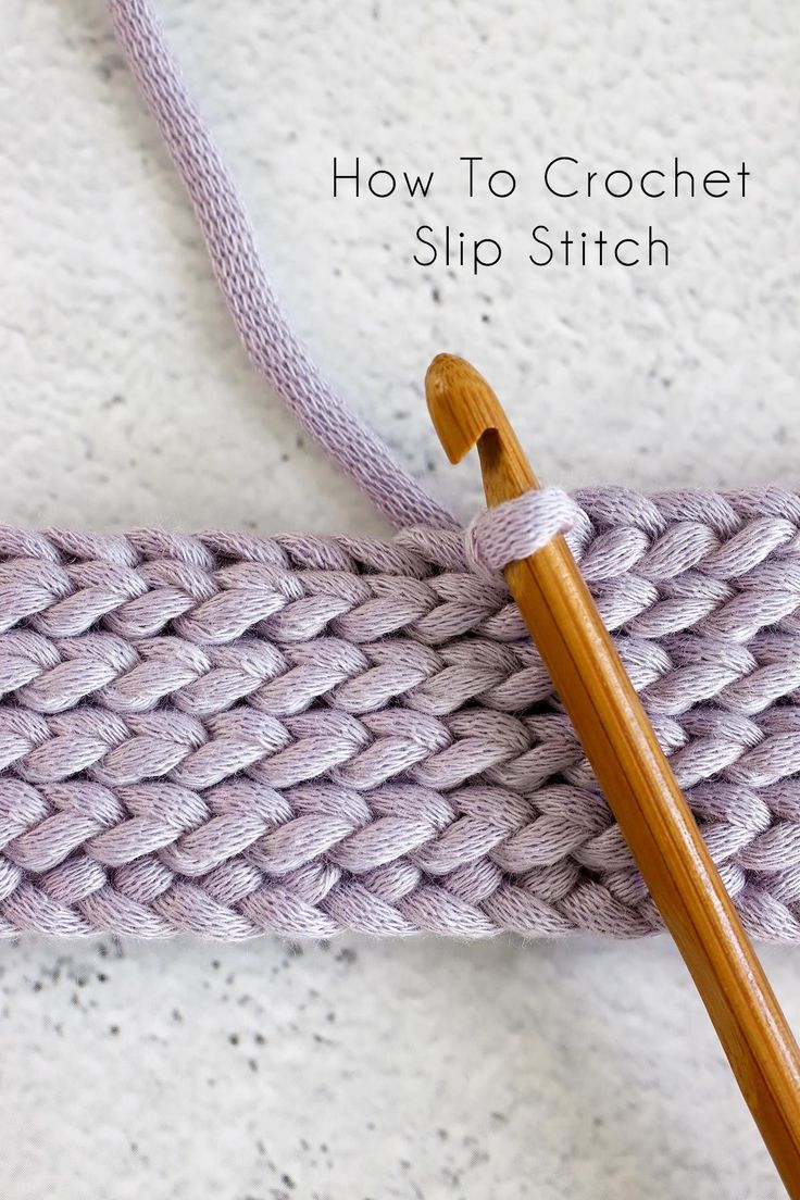 a close up of a piece of yarn with a wooden knitting needle on it and text overlay reading how to crochet slip stitch