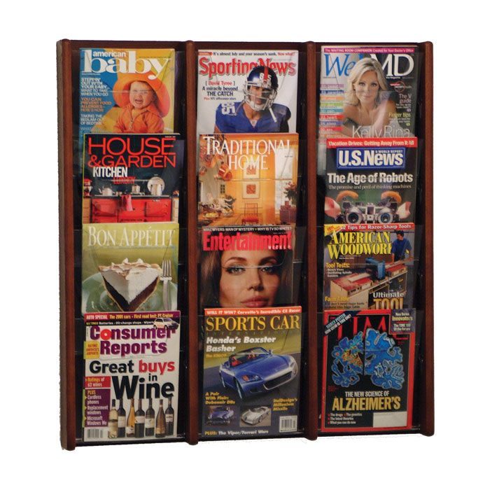 three wooden magazine racks with magazines on them