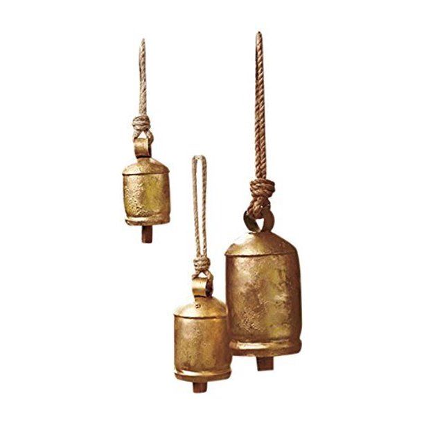 three brass bells hanging from ropes on a white background