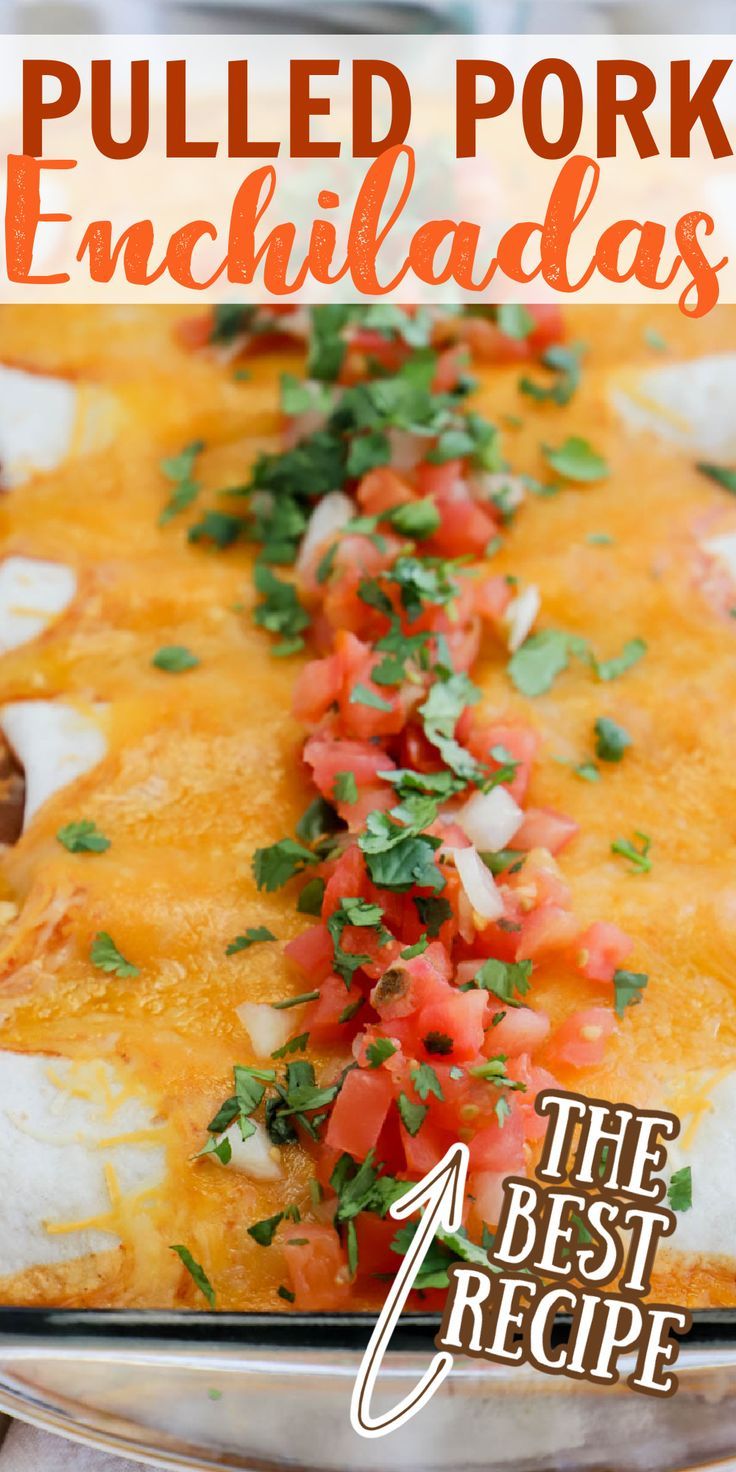 pulled pork enchiladas with tomatoes and cilantro in a casserole dish