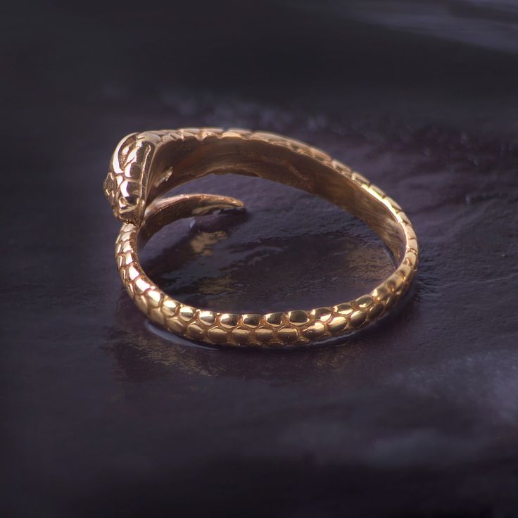 Beautiful Adjustable Snake ring in gold vermeil. The snake is the symbol of transformation and creation.  The detailed snake can be worn in any finger to match your look.  The ring comes packed in a box. Please avoid contact with chemicals. It is a 18k gold surface plating on sterling silver. It will fade over time and please do not use any silver cleaner. Snake Ring Gold, Ring Wrap, September Birthstone Jewelry, Wrap Ring, Detailed Ring, Snake Ring, Jewellery Store, Gold Snake, Jewelry Ring Box