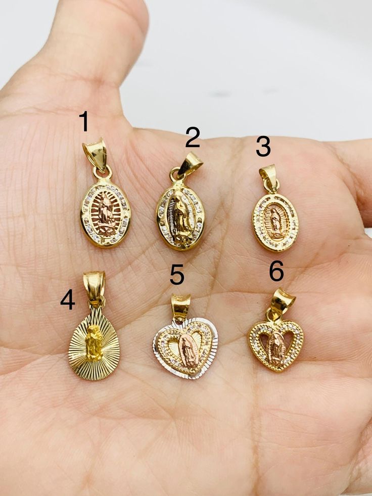 ❤️ Real 14k Gold Pendant ❤️  ❤��️ Small Virgin Mary in yellow and rose Gold 14k with white cubic zirconia ❤️ Tiny 10 millimeters charm  New Item ❤️ Dije Virgen María pequeña en Oro 14 Kilates ❤️ Mide 10 milimetros  ❤️ Oro dorado y rosado pendiente Virgen María Corazon colgante mujer con piedra blanca  SKU 6422 Virgin Mary Pendant, Gold Necklace Virgin Mary, 14k Gold Pendant With Miraculous Medal, Gold Virgin Mary Medallion, Gold Virgin Mary Medallion Charm, Gold Gold, Virgin Mary, Gold Pendant, Cubic Zirconia