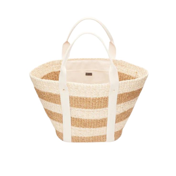 The Merrit Woven Straw Tote comes in a variety of colors, perfect for your ideal getaway. Unlike any other tote, the sustainable material builds into a unique yet chic bag that can fit all your vacation essentials. Pair with you favorite swimsuit and coverup for a day by the sea side. Handcrafted from all-natural woven abaca straw using a time-honored Filipino basketweaving technique. Features cotton handles. Measures 18” W x 11” H x 10” D with an 8” handle drop. Summer Cream Beach Bag For Beach Season, Cream Beach Bag For Everyday Use On Vacation, Cream Straw Bag For Summer Travel, Cream Beach Bag For Vacation, Cream Summer Beach Bag For Vacation, Beige Beach Bag For Vacation, Eco-friendly Cream Beach Bag For Vacation, Cream Bucket Bag For Beach Travel, Beige Straw Bag For Everyday Beachwear