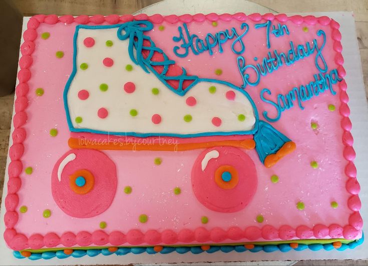 a birthday cake with pink and blue icing on it's side that says happy 7th birthday sunnypapy