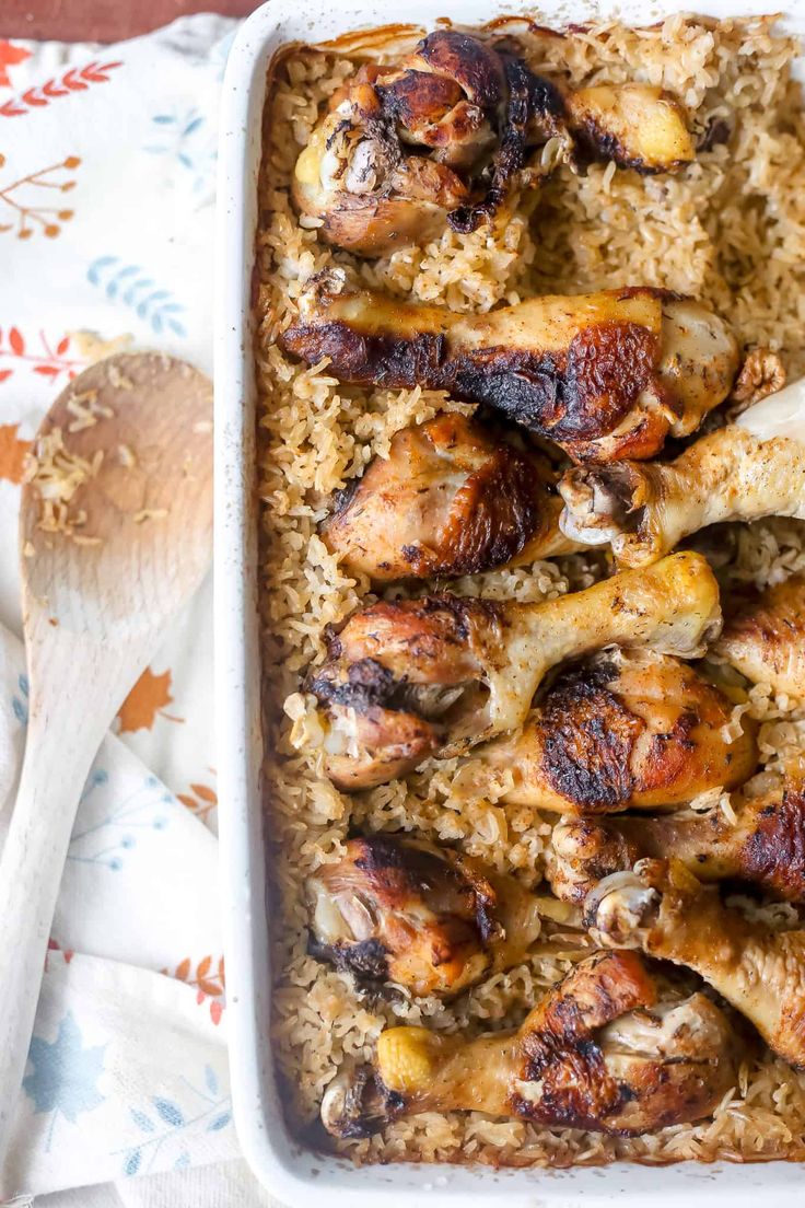 a casserole dish with chicken and rice in it