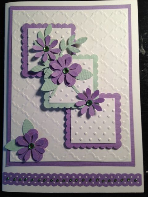 a close up of a card with flowers on it