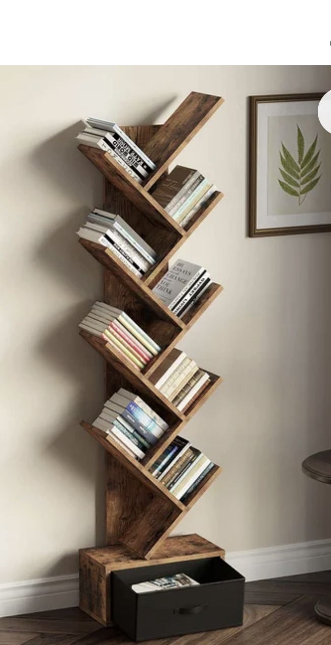 a bookshelf made out of wooden planks in the corner of a room