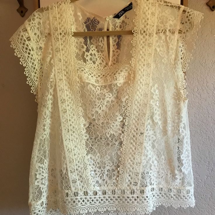 New Without Tags. Size Medium. Beautiful Lace Top. It Is An Off White In Color Cheap Zara Lace Top, White Feminine Lace Top For Brunch, Feminine White Lace Top For Brunch, White Lace Top For Spring, White Lace Top For Day Out, White Lace Top For Spring Brunch, White Lace Top For Brunch In Spring, Zara Summer Lace Blouse, Zara Lace Top For Spring