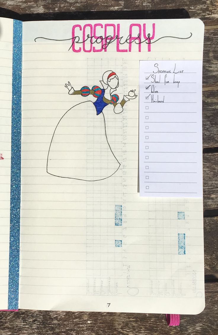 a notebook with an image of a woman in a ball gown and the words cosplay written on it