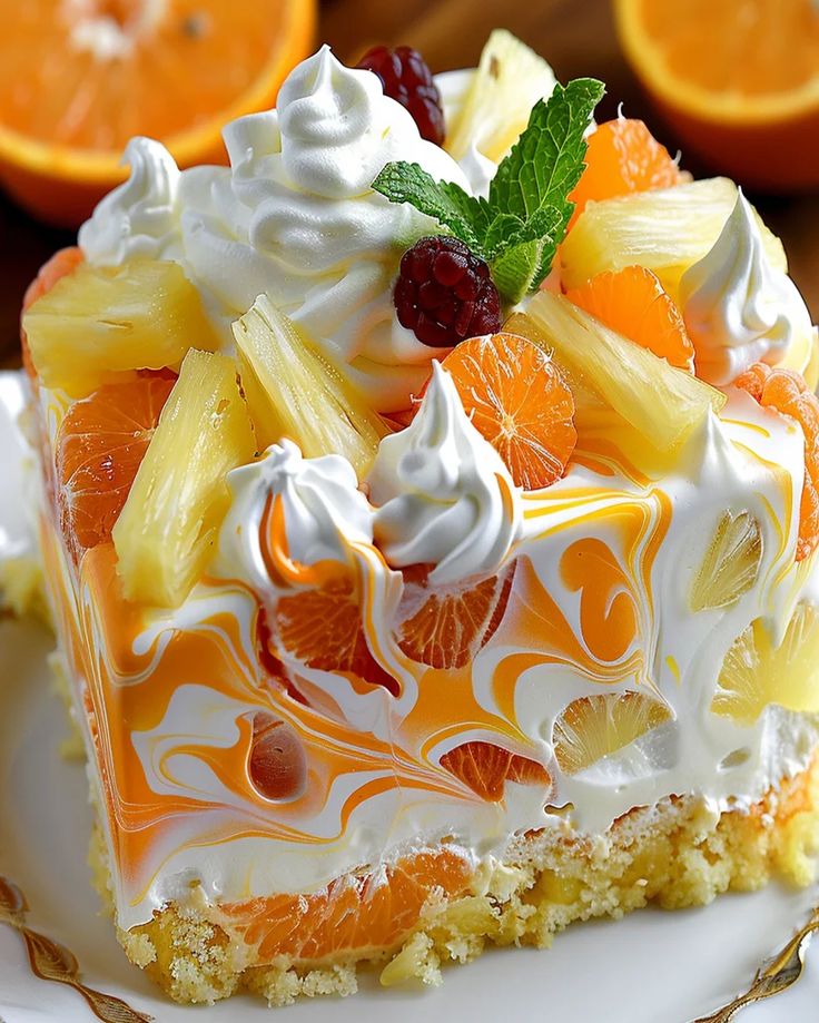 a piece of cake on a plate with oranges and other fruit in the background