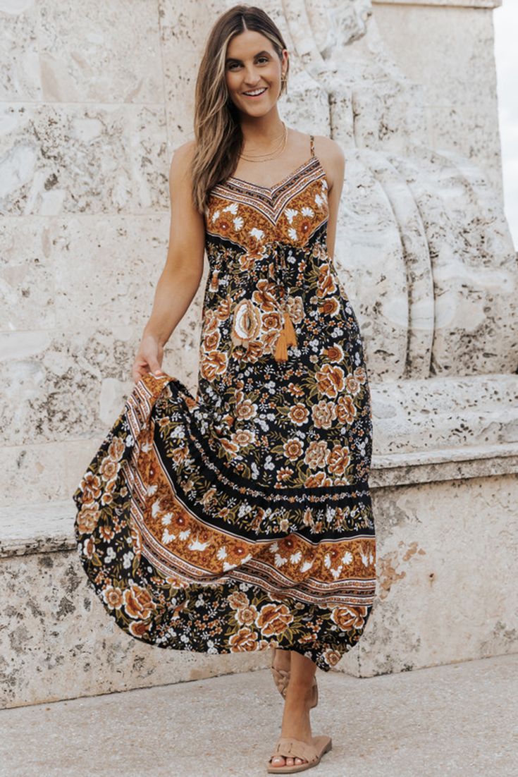 Black Retro Boho Floral Tassel Tie Maxi Dress Black Bohemian Dress With Loose Fit, Black Flowy Boho Dress, Black Flowy Bohemian Dress, Flowy Black Boho Dress, Black Flowy Boho Dress For Festival, Black Bohemian Dress With Boho Print, Black Boho Print Dress For Festival, Black Boho Print Maxi Length Dress, Black Boho Dress With Print For Vacation