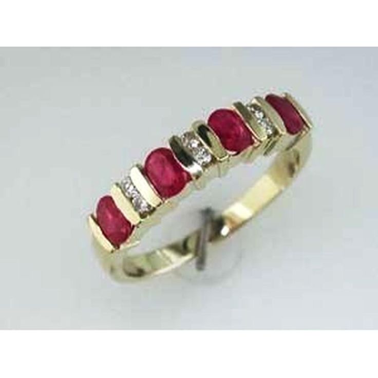 Enchanting 14K Yellow Gold Ruby & Diamond Band - Timeless Beauty Formal Oval Ruby Ring With Single Cut Diamonds, Elegant Half Eternity Ruby Ring, Oval Diamond Cut Ruby Ring, Ruby Jewelry With Diamond Accents In Baguette Cut, Baguette Cut Ruby Jewelry With Diamond Accents, Elegant Oval Ruby Ring With Single Cut Diamonds, Oval Ruby Rings With Single Cut Diamonds, Yellow Gold Ruby Ring With Diamond Accents, Red Ruby Jewelry With Single Cut Diamonds