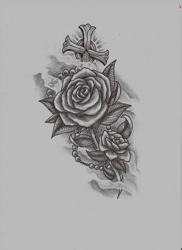 a cross and rose tattoo design on the back of a woman's left arm