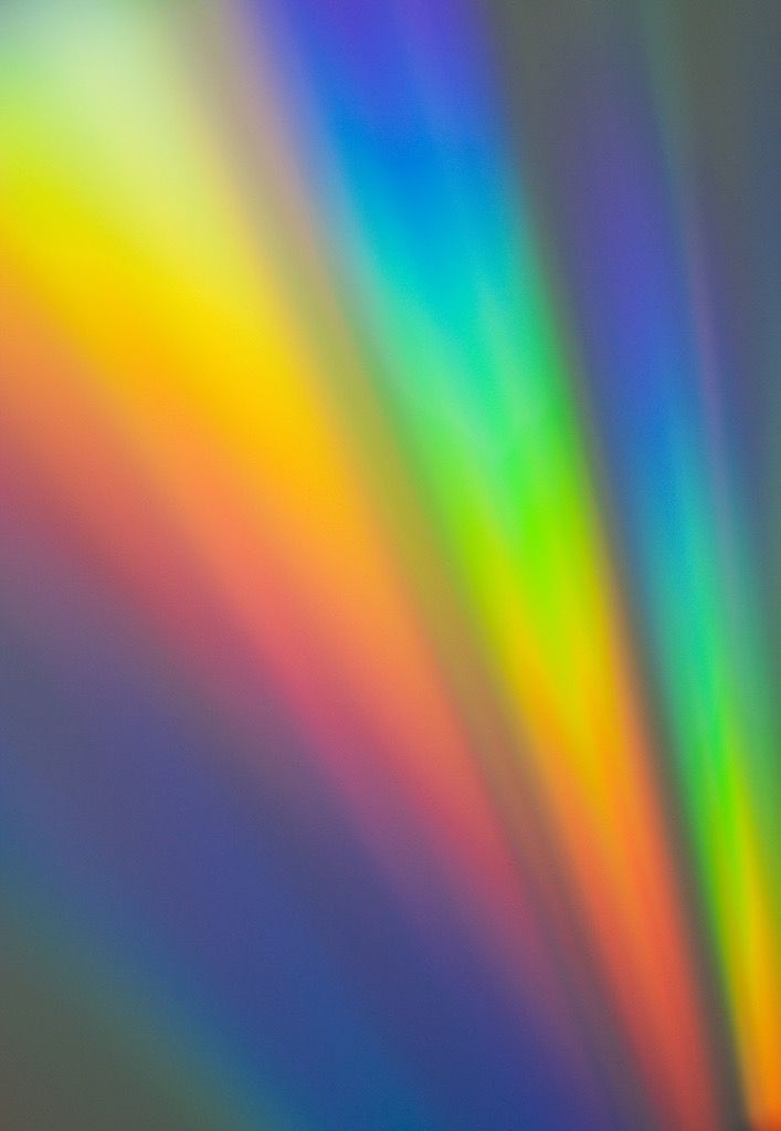 an image of the light coming in from behind some colored lights on a wall or ceiling