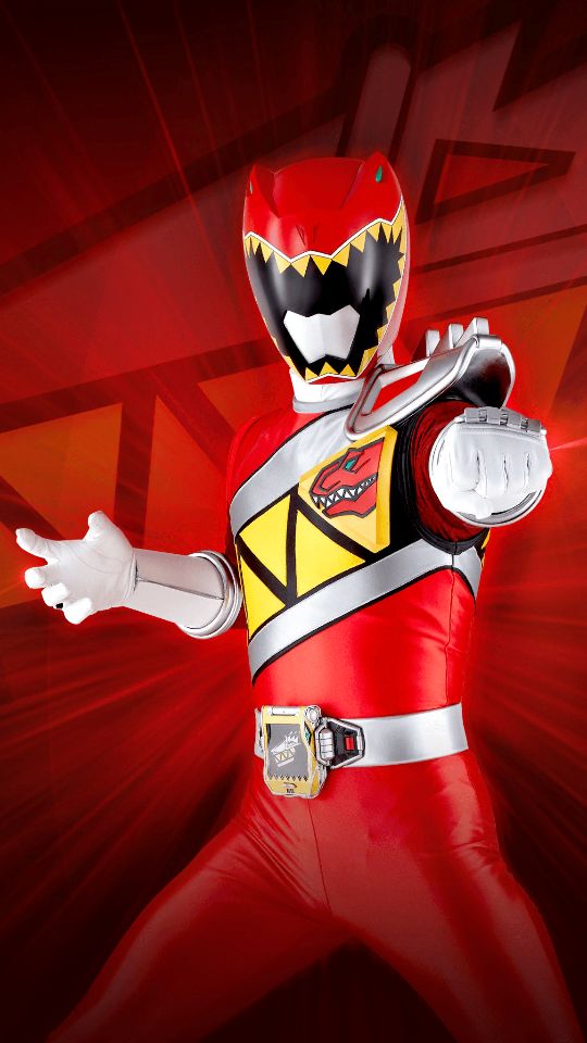 a man in a red and yellow power ranger costume with his arms out to the side