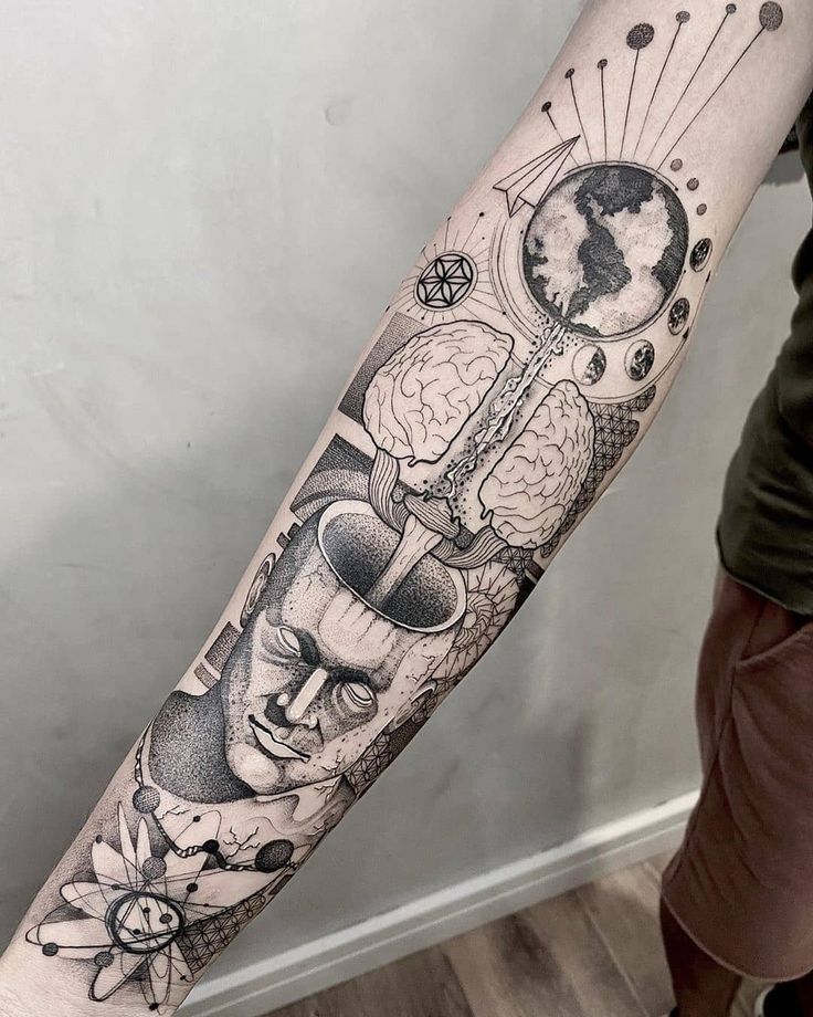 a man's arm with an abstract tattoo on it