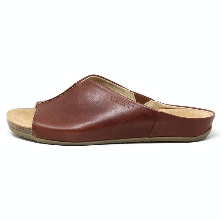 The Women's 'Mia' Slide Sandal showcases a stylish brown leather open-toe design complemented by a fashionable leather wrap. It includes a cushioned suede footbed and sits atop a flat beige sole Leather Slides Women, Mia Sandals, Wool Clogs, Expensive Shoes, Low Wedges, Slides Women, Fit Details, House Shoes, Leather Slides