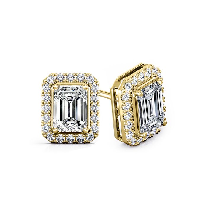 Halo set diamond stud earrings make an elegant statement for any occasion. These 18k yellow gold studs can last a lifetime and beyond. The earrings feature classic Emerald-cut natural diamonds that holds a total weight of 1.20 ct. center stone surrounded by small diamonds 0.80 ct. total weight Emerald-cut side diamonds, together with a total weight of 2.00 ct. The studs are available with push-back or screw back or guardian back . Black Diamond Pendant, Black Diamond Studs, Halo Diamond Earrings, Solitaire Diamond Pendant, Colored Diamond Rings, Earrings Emerald, Halo Earrings, Halo Earrings Studs, Halo Setting