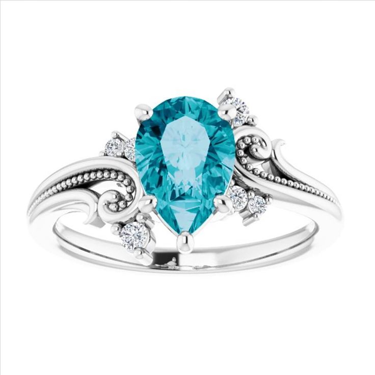 Vintage Floral Pear Swiss Blue Topaz Engagement Ring 14k White Gold, Filigree Tear Drop London Blue Ring, Vine Pear Sky Blue Diamond Ring Sopia Jewelry Topaz is a December birthstone and 4th wedding anniversary. Vintage floral pear shape center stone set in solid 14k gold or platinum ring. RING DESCRIPTION: Center Stone Type: Genuine Topaz Center Stone Shape: Pear Shape Center Stone Quality: AAA Center Stone Measurement: 9x6mm Center Stone Carat Weight Approx: 1.75 Carat Total Carat Weight Appro Swiss Blue Topaz Engagement Ring, Blue Engagement Ring, Antique Filigree, Blue Diamond Ring, Blue Ring, Aquamarine Engagement Ring, Aquamarine Rings, Swiss Blue Topaz, London Blue