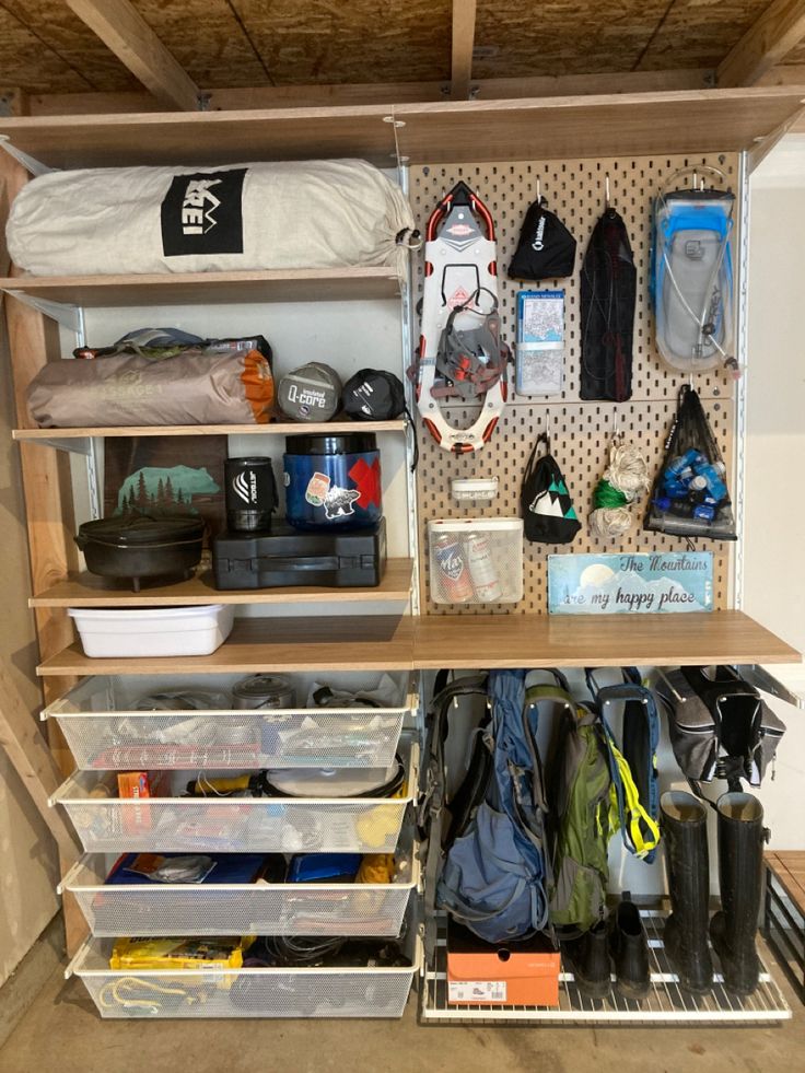 an organized closet with lots of items on the shelves