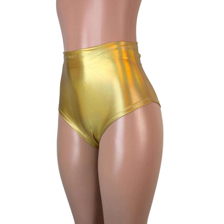 Our classic high waist hot pants with scrunch ruching detail in back to offer a "cheekier" look. These hot pants are made of stretchy gold opal holographic spandex and sit high on your natural waist. Wear as a bikini bathing suit bottom, panties, rave shorts, running shorts, etc. They have a built in liner and are made to be flattering to your figure. Gold Stretch Shiny Bottoms, Fitted Shiny Gold Bottoms, High Waist Dancewear Bottoms For Summer, Stretch Shiny High Waist Pants, High Waist Stretch Shiny Pants, Gold Stretch Bottoms For Party, Gold Fitted Bottoms For Club Wear, Gold Fitted Bottoms For Club, Fitted Gold Bottoms For Club Wear