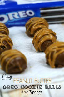 chocolate peanut butter oreo cookie balls are on a baking sheet and ready to be eaten