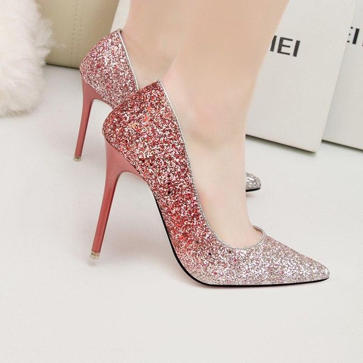 This fun and sparkly pump is sure to be a new fave in your shoe wardrobe. Bringing some 'bling' to your shoe collection and really making your outfit pop. Comes in three fabulous colors and features an approximate 3.5" heel. Pairs perfectly with jeans, pants, skirts, shorts, dresses, rompers and jumpsuits. Pink High Heel Heels For Party Season, Glamorous Round Toe Court Shoes For Party, Glamorous Round Toe Party Court Shoes, Glamorous Pointed Toe Shimmer Heels, Glamorous Closed Toe Court Shoes For Party, Glamorous High Heel Court Shoes For Parties, Pink Closed Toe Court Shoes For Party, Pink High Heel Heels For Prom, Pink High Heel Prom Heels