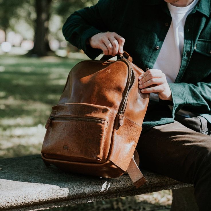 Classic, functional, distinctive. The Walker Leather Backpack checks all the boxes for life’s everyday journeys. Our universal dual-strap pack features premium leather and canvas material, uniting superior quality with timeless style. The primary compartment – accompanied by an easy-access external zipper pocket – offers an efficient storage design complete with laptop sleeve, sewn-in pouch with leather trim, and internal zipper pocket. No matter the place, no matter the plans... the Walker has Classic Cognac Backpack For Travel, Classic Satchel Backpack With Waxed Finish, Classic Cognac Travel Backpack, Classic Waxed Finish Satchel Backpack, Classic Leather Backpack With Smooth Grain For Travel, Cognac Leather Backpack With Leather Lining, Classic Everyday Backpack With Waxed Finish, Classic Satchel Backpack, Classic Waxed Finish Backpack