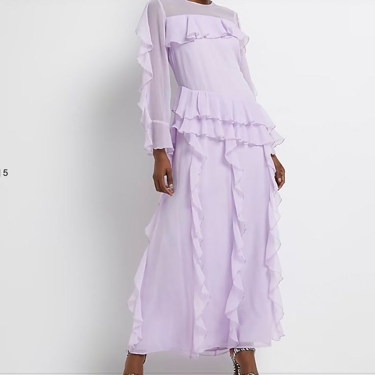 New With Tags, Never Worn. Tag Says Size Medium But Looks Like A Large Or Xl, Size 8-10 Us. Measurements: Bust 92-97cm Waist 73-78cm Chiffon Midi Dress With Ruffles For Daywear, Chic Purple Maxi Dress With Ruffles, Spring Evening Ruffle Dress In Chiffon, Spring Evening Ruffle Chiffon Dress, Chiffon Maxi Dress With Ruffles For Daywear, Chiffon Ruffle Dress For Spring Evening, Purple Long Sleeve Maxi Dress With Ruffles, Purple Ruffled Maxi Dress For Spring, Purple Long Sleeve Ruffled Maxi Dress