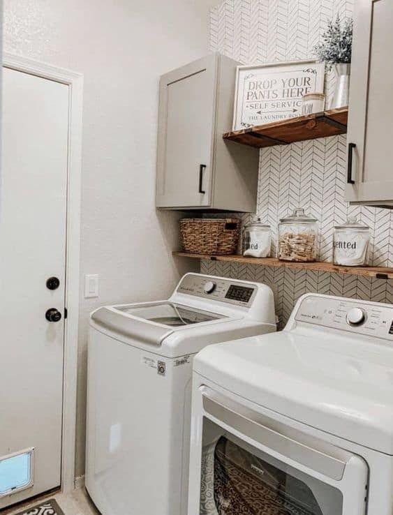 a washer and dryer in a small room