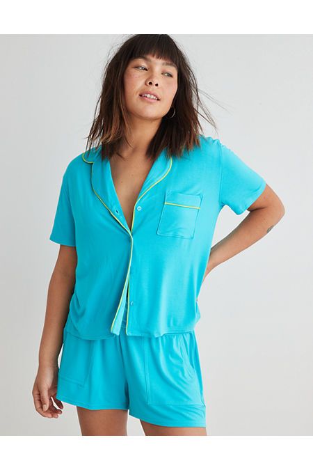 Real Soft® fabric (it's now Real Good!)/Button up/Front pocket (!!!)/Accessibility deets: lightweight fabric for comfort & air flow! Short Sleeve Tops With Button Closure For Loungewear, Casual Sleepwear With Button Closure And Short Sleeves, Blue Button-up Sleepwear With Button Closure, Green Buttoned Tops For Loungewear, Short Sleeve Sleepwear With Pockets For Lounging, Short Sleeve Sleep Tops With Pockets, Button-up Sleepwear With Pockets For Loungewear, Blue Buttoned Tops For Loungewear, Relaxed Fit Tops With Pockets For Lounging