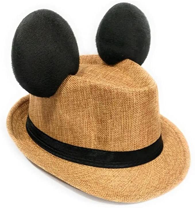 a brown hat with two black ears on it