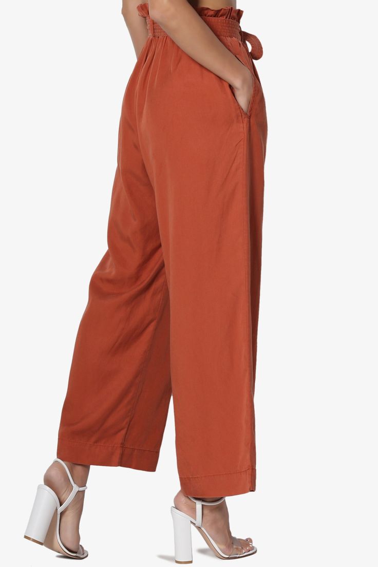 Upgrade your look with chic culotte pants, styled with an detachable tie belt and elastic paperbag waist. A high-waist hits just right and falls into a wide leg crop fit. Pair these with the Crop Top for full effect.Tencel woven, high rise with paperbag pleats, Pull onElasticized waist, Detachable sash tie beltWide leg, cropped length, side slant pocketsSize Guide : Fits true to size, take your normal size(S=1-3, M=5-7, L=9-11)Model size : 5'3" height, 34" bust, 24" waist, 34" hip, Normally wear Versatile Belted Wide Leg Pants, Relaxed Fit Paperbag Waist Pants For Work, Relaxed Fit Paperbag Waist Workwear Pants, Belted Wide Leg Pants For Spring, Spring Solid Color Belted Wide Leg Pants, Versatile High-waisted Relaxed Fit Culottes, Versatile High-waisted Culottes With Relaxed Fit, Chic Cotton Straight Culottes, Wide Leg Pants With Tie Waist For Work