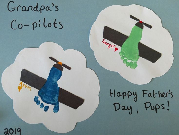 father's day handprints are displayed on a bulletin board with the words grandpa's co - pilot