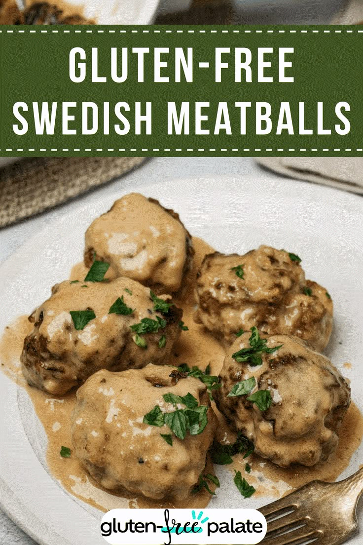 a white plate topped with meatballs covered in gravy