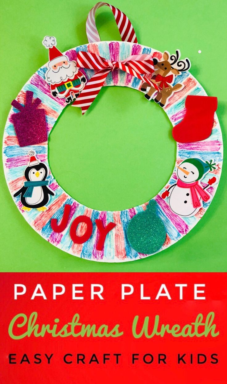 paper plate christmas wreath craft for kids to make on the front of a green wall