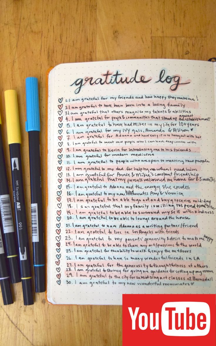 an open notebook with writing on it next to three markers and a pen that says, grateful log