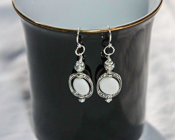 Elegant Silver Maya Earrings with white round natural shell and Swarovsky crystal beads. Each earring measures 1.75" long including earwire. Jewelry comes carefully and securely packaged and shipped to you promptly. White Shell-shaped Earrings For Vacation, Cheap White Shell-shaped Earrings, Nickel-free White Shell Earrings, White Shell-shaped Pearl Earrings For Beach, Bohemian Nickel-free Shell Earrings, Palm Beach Fl, Shell Earrings, West Palm Beach, West Palm