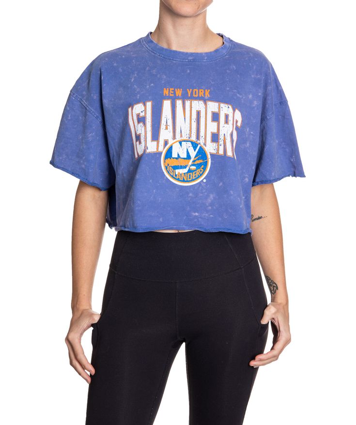 Woman standing in front of a white background wearing an oversized, blue, acid wash crop top - featuring a New York Islanders logo in the center of the shirt. Beach Gym, Blue Crop Top, Pretty Shorts, New York Islanders, Sports Skirts, Small Crop Tops, Blue Crop Tops, New York Rangers, Day At The Beach