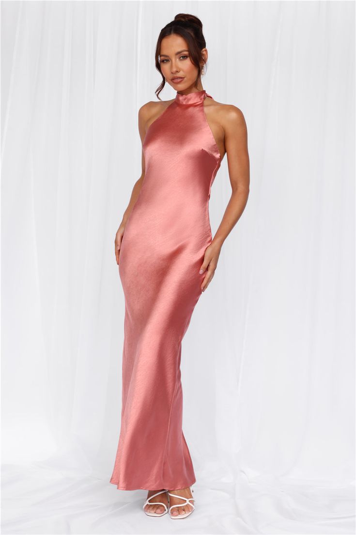 Length from neck to hem of size S: 142cm. 
 Chest: 36cm, Waist: 34cm, across front only of size S. 
 Maxi dress. 
 Lined. 
 Model is a standard XS and is wearing size XS. 
 True to size. 
 Non-stretch. 
 Luxurious satin. 
 Halter tie neckline. 
 High neck. 
 Elastic back. 
 Vent extension. 
 Straight, flowy silhouette. 
 Zipper with hook eye closure.  
 Cold hand wash only. 
 Polyester. 
 This material is very delicate. Please handle with care. 
 Please Note: This product is a Exclusive.  
 
 St Unique Pink Bridesmaid Dresses, Bridesmaids Theme, Salmon Bridesmaid Dresses, Halter Neck Prom Dress, High Neck Bridesmaid Dresses, High Neck Dress Formal, Blue Wedding Guest Dresses, Coral Bridesmaid Dresses, Plisse Dress