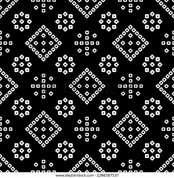 an abstract black and white background with many small squares in the shape of crosses,